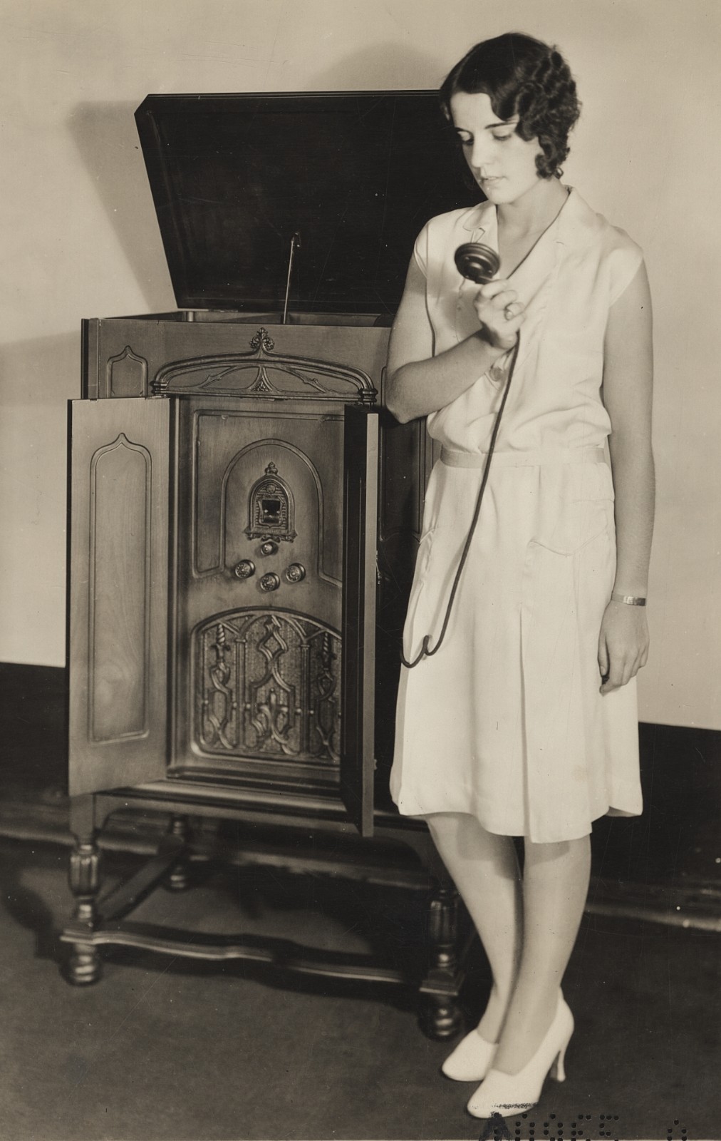 c. 1920\'s Woman Using Device to Record Phonographs at Home Photograph