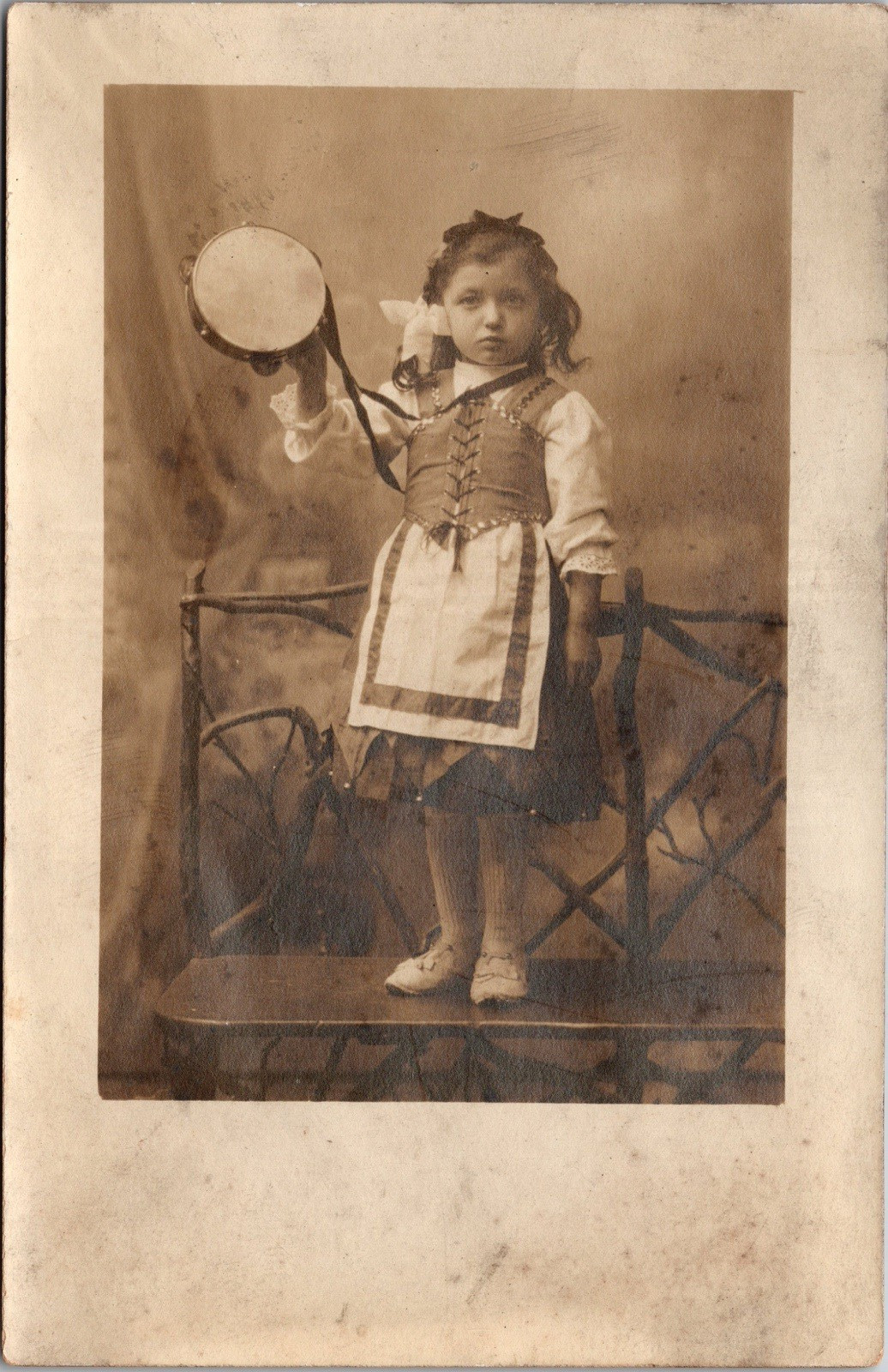 Postcard Real Photo RPPC Young Girl Valentina Standing on Bench with Tambourine