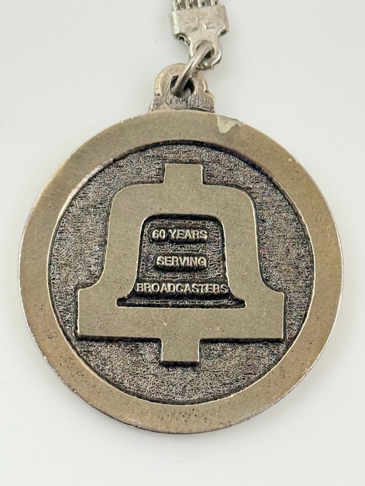 Vtg ATT 1983 NAB 60 Years Serving Broadcasters Bell Commemorative Medal Keychain