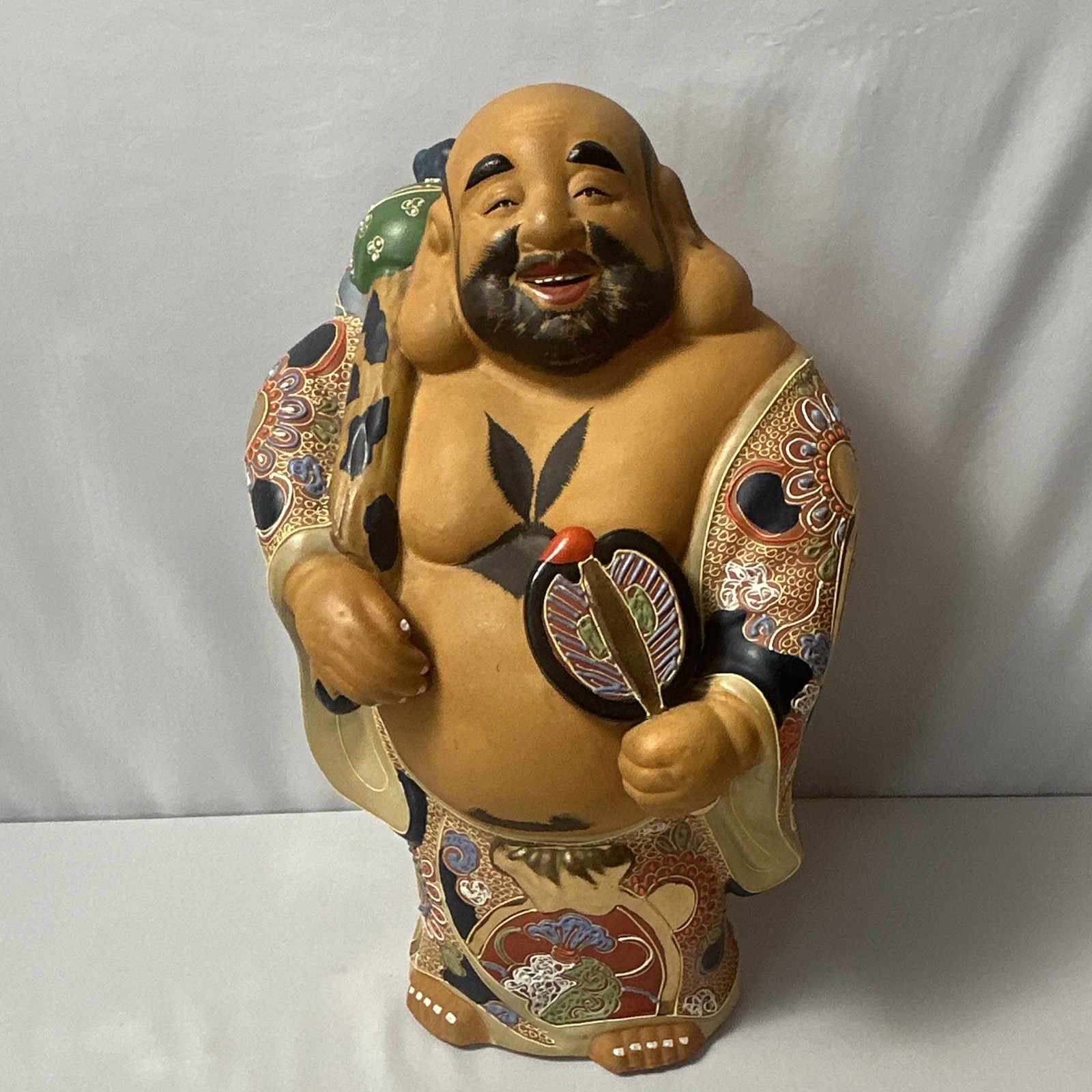 Vintage Japanese porcelain figurine of Hotei the laughing Buddha. 15\