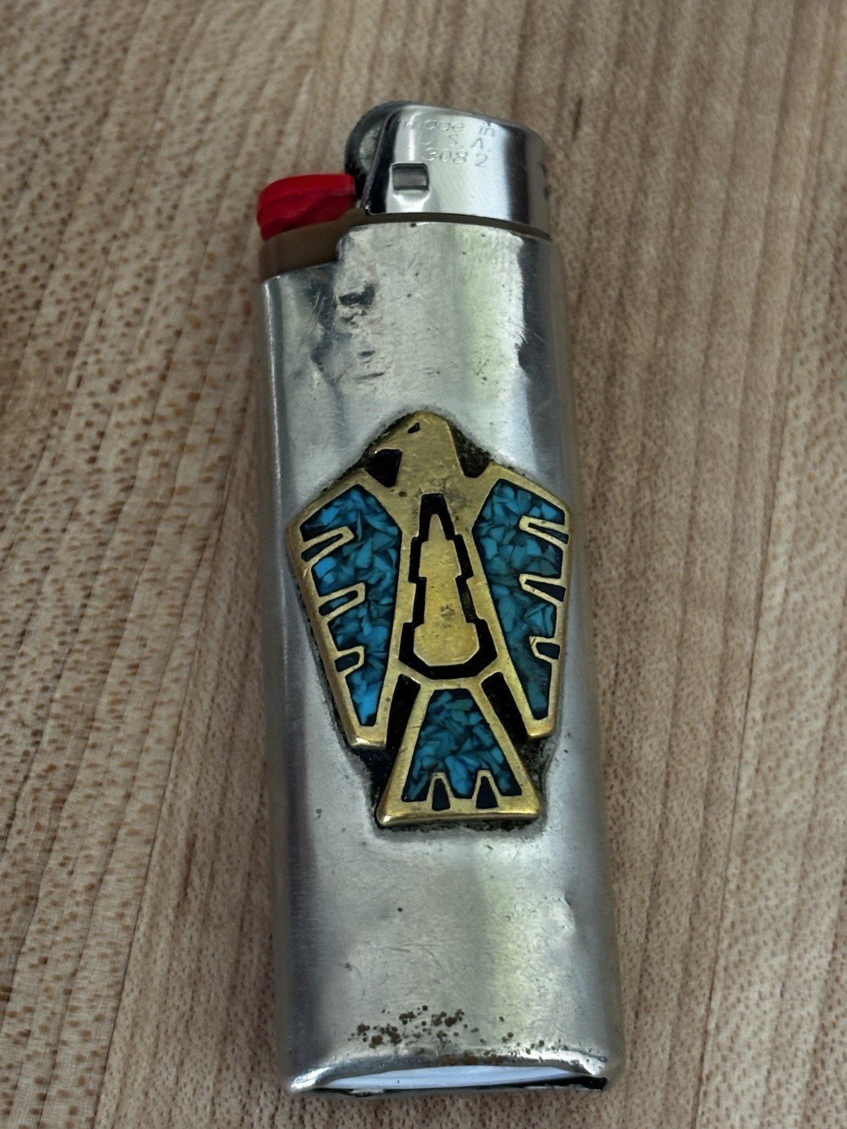 Vintage Lighter Sleeve With Native Thunderbird Design On It