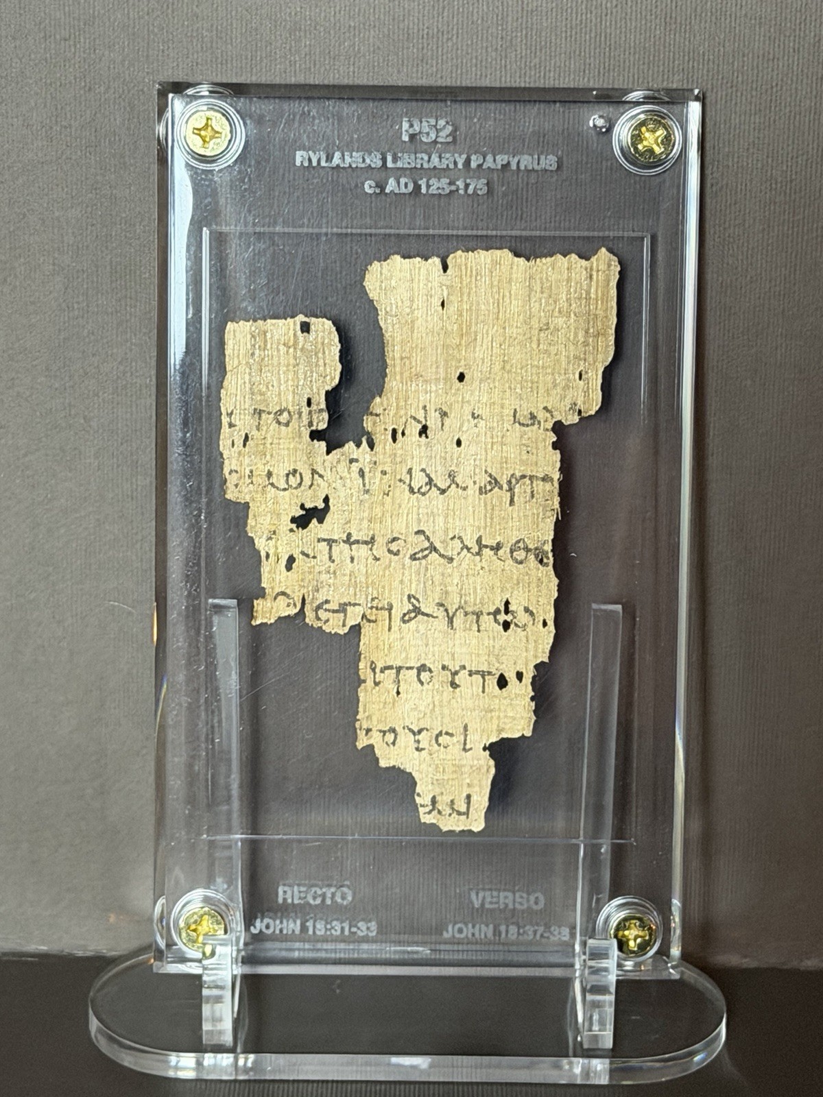 P52 John Rylands Papyrus.   Gospel of John. Biblical manuscript. Hand Distressed