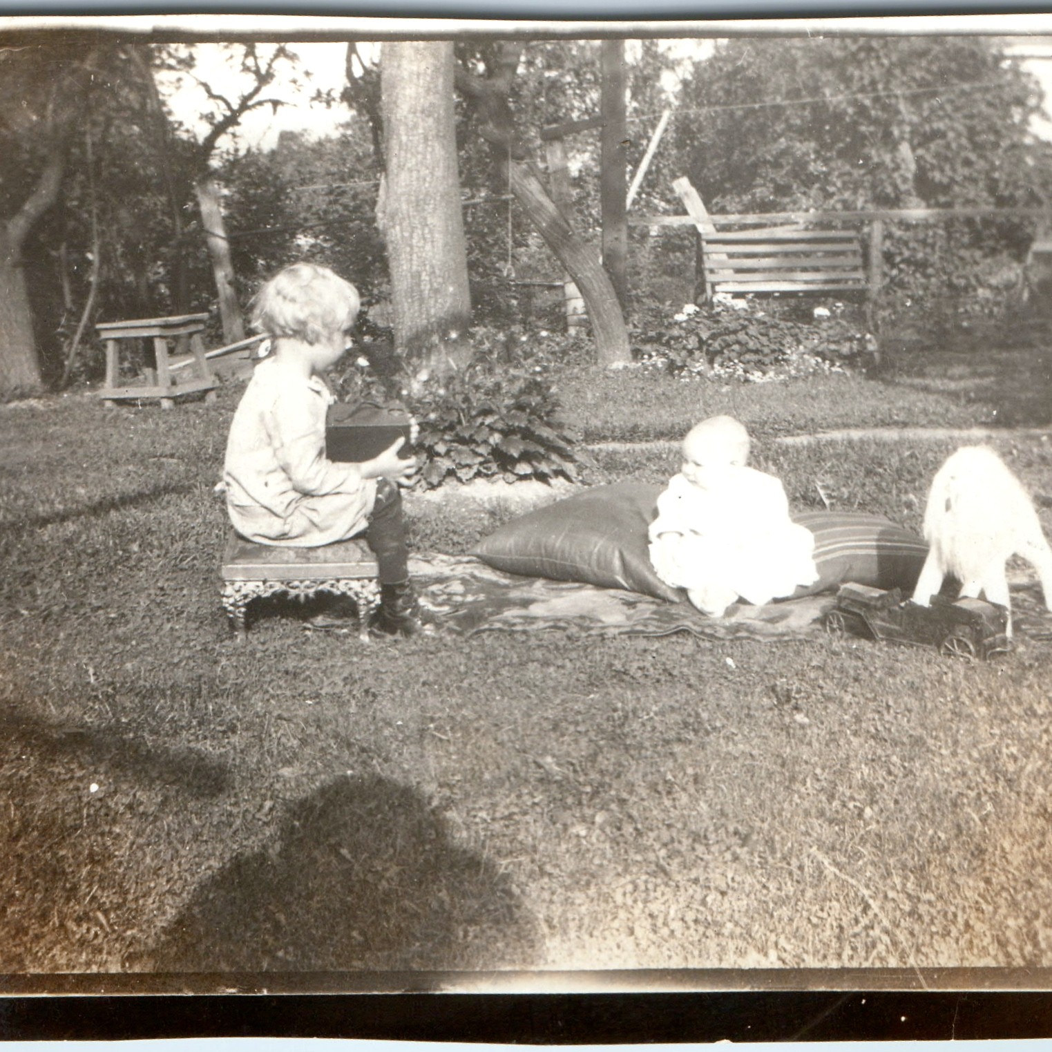 c1920s Cute Baby Child Holding Camera Toy Pressed Steel Truck Dog Backyard Mini