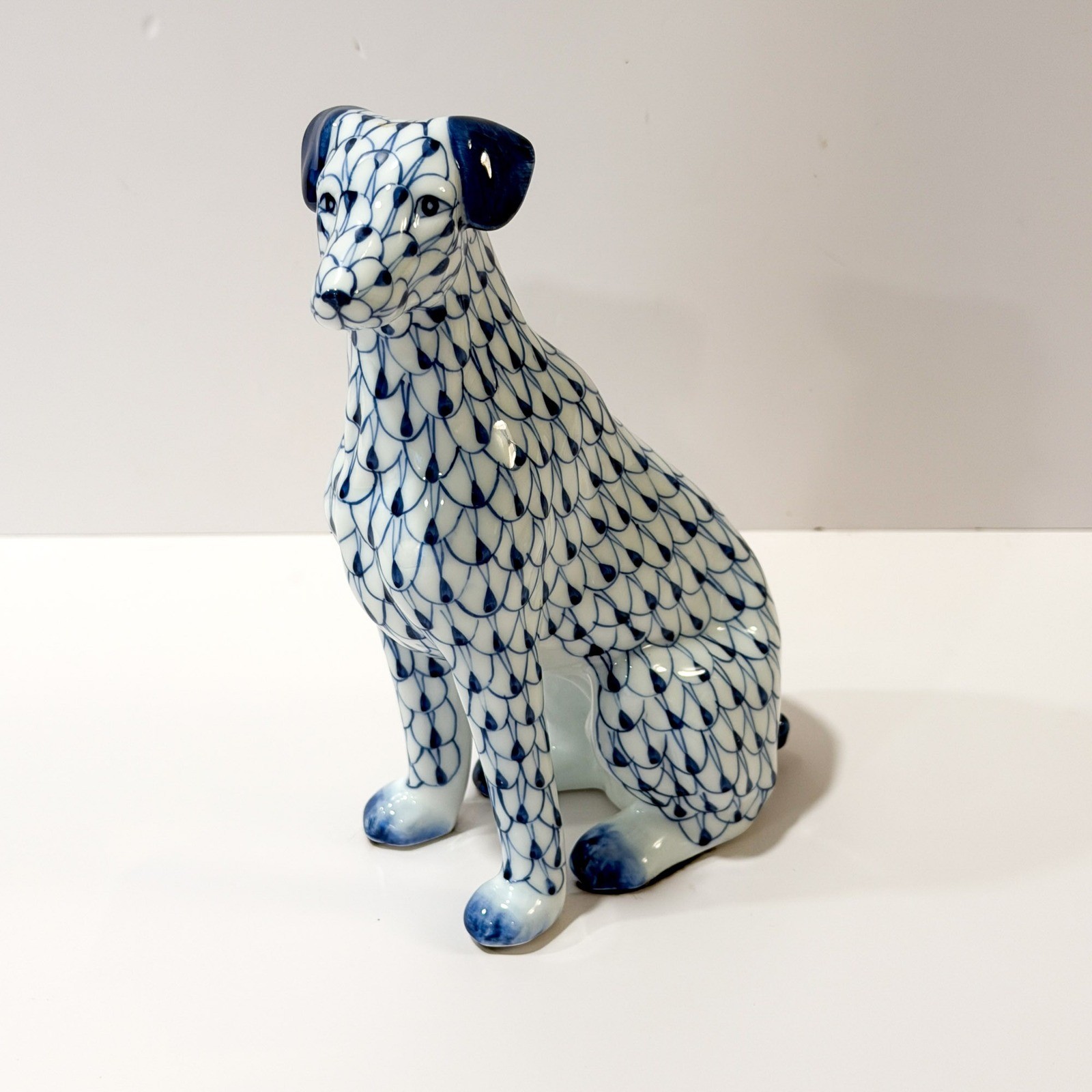 Andrea by Sadek Sitting Dog Figurine Blue White Fishnet Porcelain