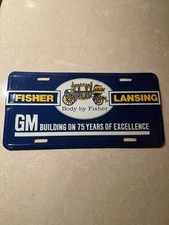GM General Motors Lansing MI Fisher Body plant booster license  plate 75 years picture