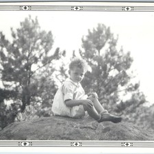 c1920s Cute Young Child Sit Rock Snapshot Photo Pine Adorable Toddler Boy Girl picture