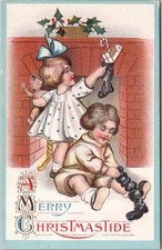 Vintage 1910s CHRISTMAS Postcard Boy & Girl / Stockings 