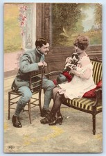 c1910's Romance Soldier Couple Woman Holding Cat WWI Antique Unposted Postcard picture