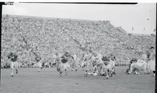 Don Schaefer Busting Through Line 1955 Photo - Don Schaefer, Notre Dame, goes th picture