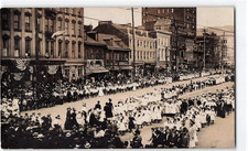Early 1900's RPPC, Large Parade or Public Gathering Along a Busy Downtown Street picture