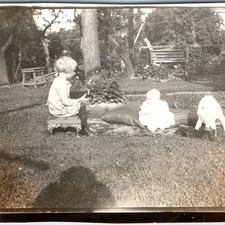 c1920s Cute Baby Child Holding Camera Toy Pressed Steel Truck Dog Backyard Mini picture